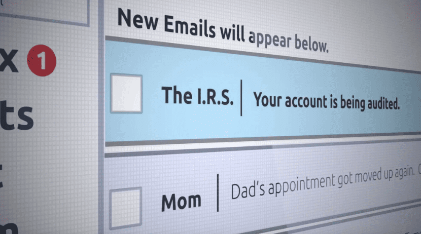 Image of a computer screen with an email from "The I.R.S." with the subject line: Your account is being audited.