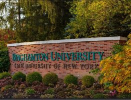 brick wall with the words Binghamton University on it