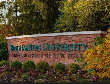 brick wall with the words Binghamton University on it