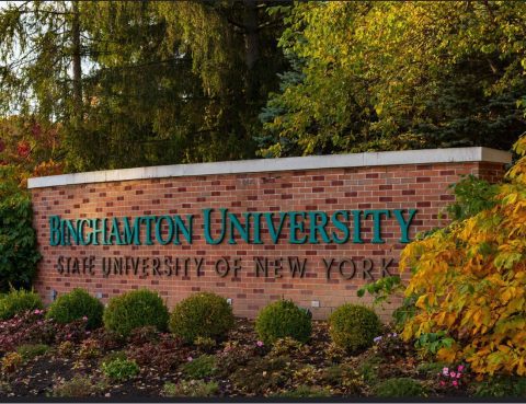 brick wall with the words Binghamton University on it