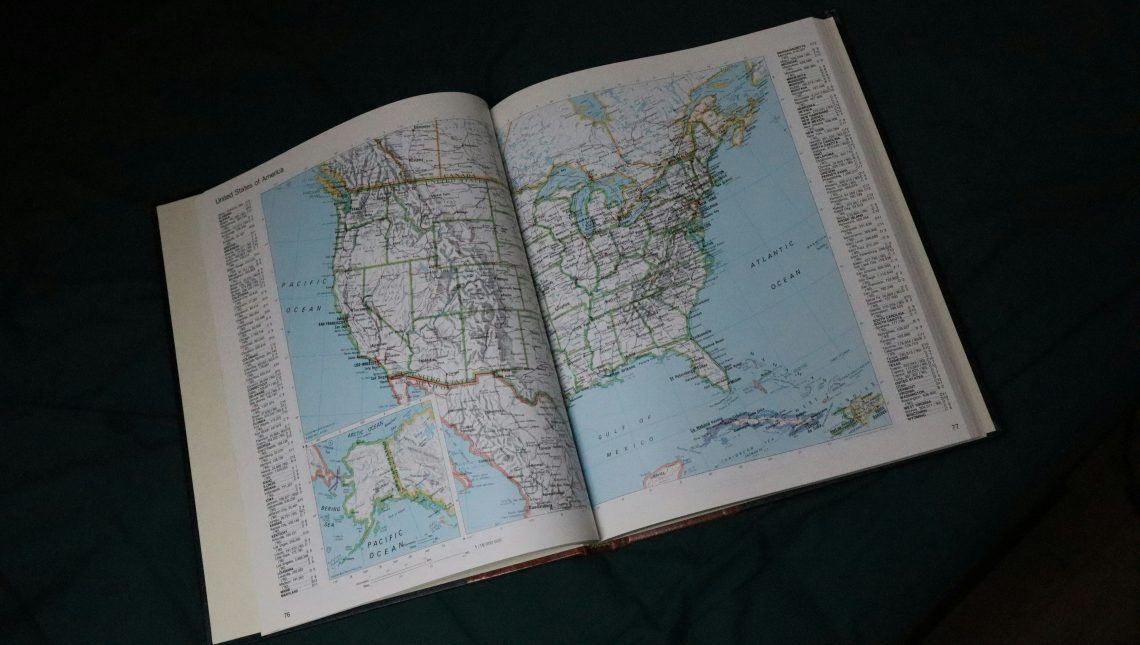 A book with a map of the US spread across two pages