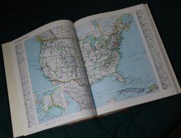 A book with a map of the US spread across two pages