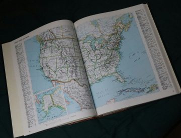 A book with a map of the US spread across two pages