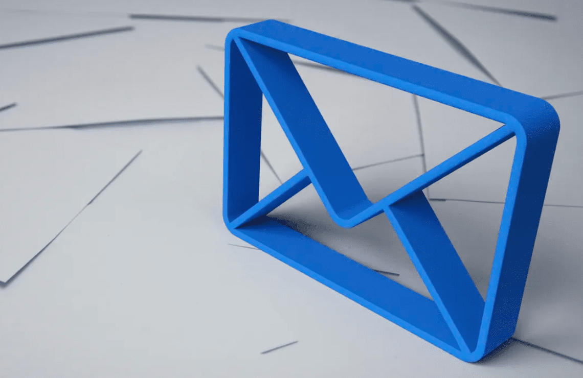 A three dimensional blue outline of an envelope standing on top of a mess of white envelopes
