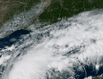 view of hurricane isaias over a map of the USA gulf coast